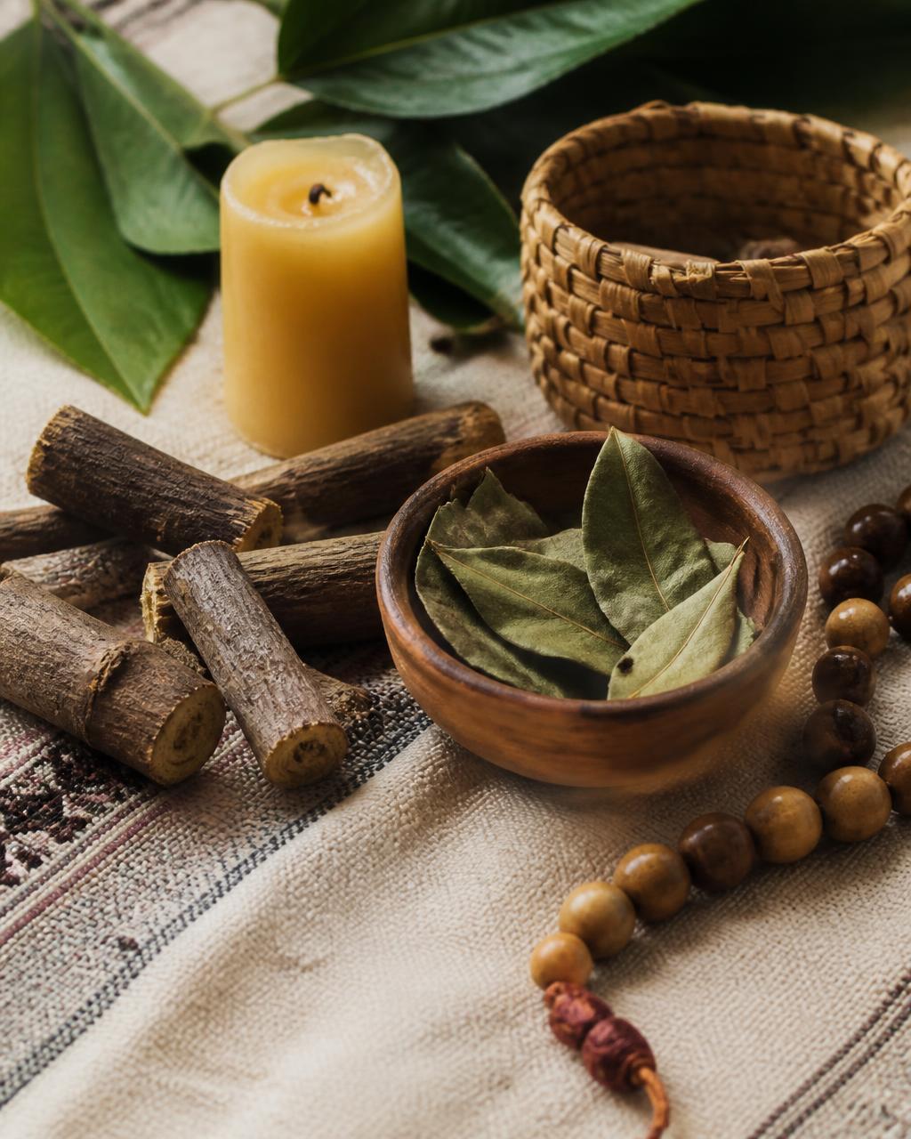 Ceremonial still life with woven textile, botanicals and natural wood